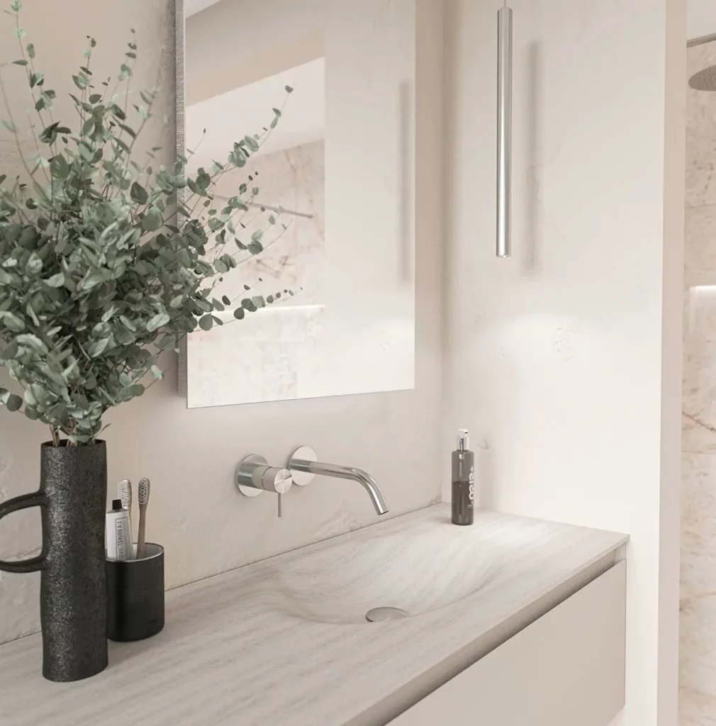 a bathroom with a sink and mirror