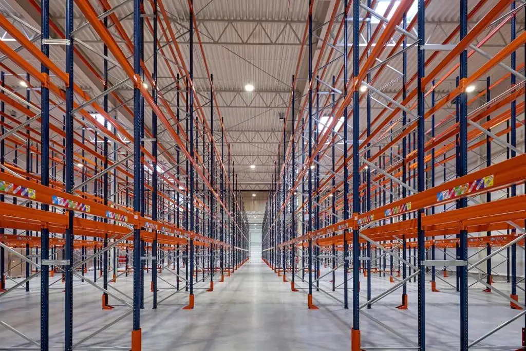 a large warehouse with many shelves
